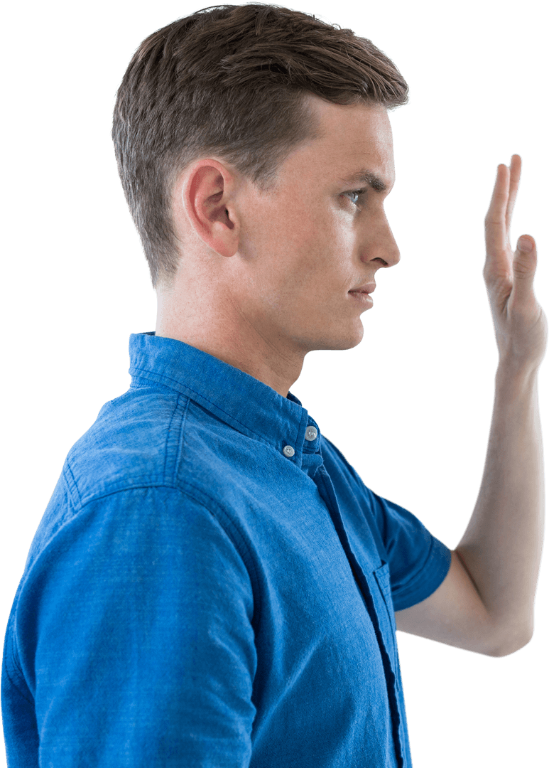 Side profile of man interacting with transparent screen