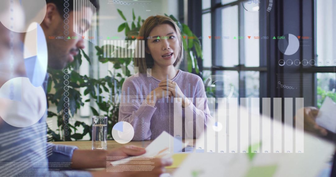 Diverse Team Analyzing Financial Data with Augmented Reality Overlay