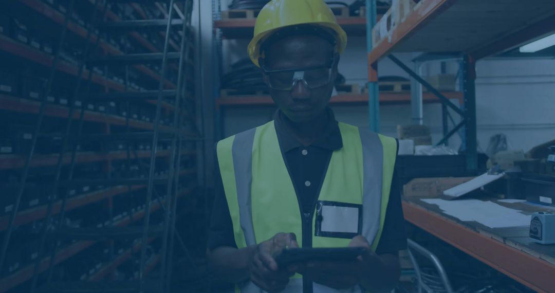 Warehouse Worker Checking Inventory with Modern Technology