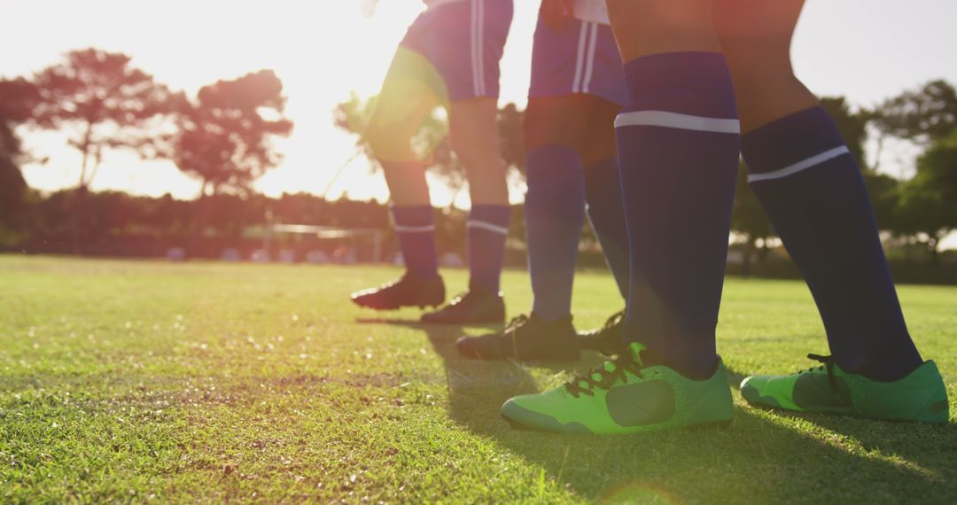 Youth Soccer Players Forming Line on Field Backlit by Sun - Free Images, Stock Photos and Pictures on Pikwizard.com