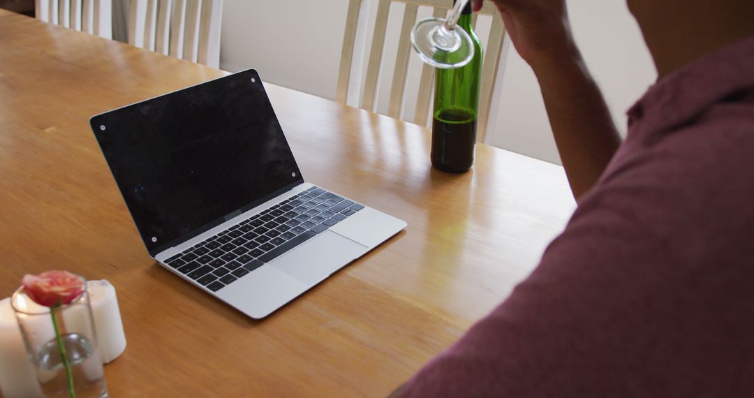 Person Relaxing with Wine While Using Laptop at Home - Free Images, Stock Photos and Pictures on Pikwizard.com