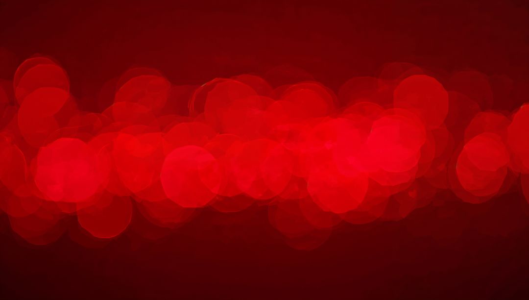 Glowing Red Bokeh Band Forming Soft Abstract Circle Lights for Festive Background