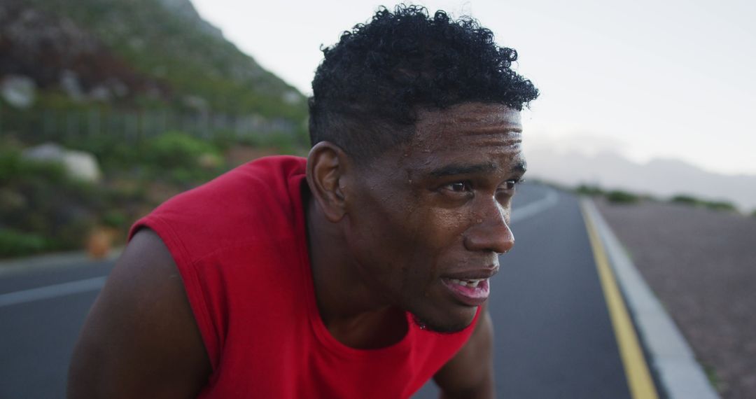 Exhausted Black Man Taking Break During Outdoor Run - Free Images, Stock Photos and Pictures on Pikwizard.com