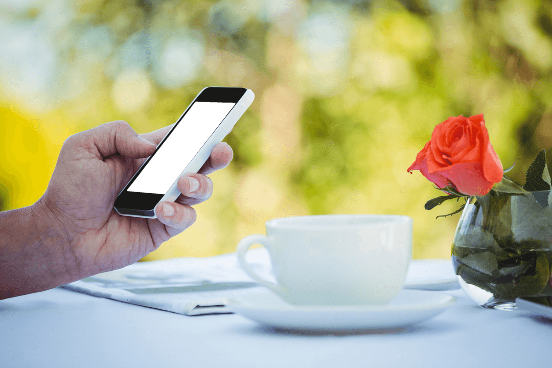 Transparent Smartphone and Coffee Cup On Table