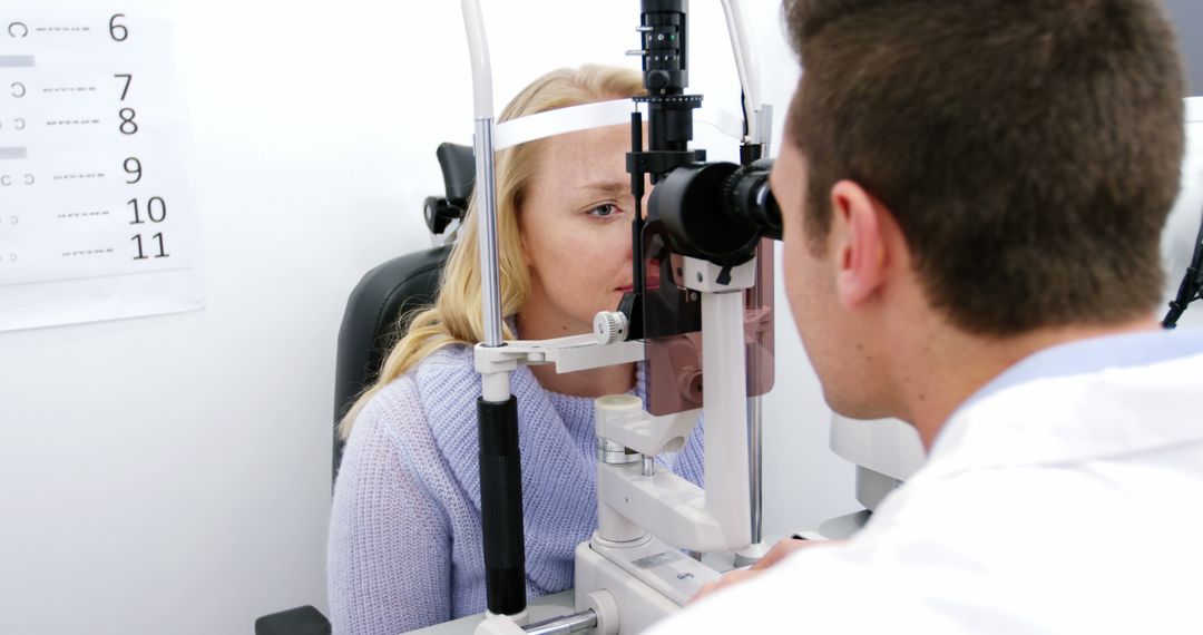 Optometrist Conducting Eye Examination with Female Patient - Free Images, Stock Photos and Pictures on Pikwizard.com