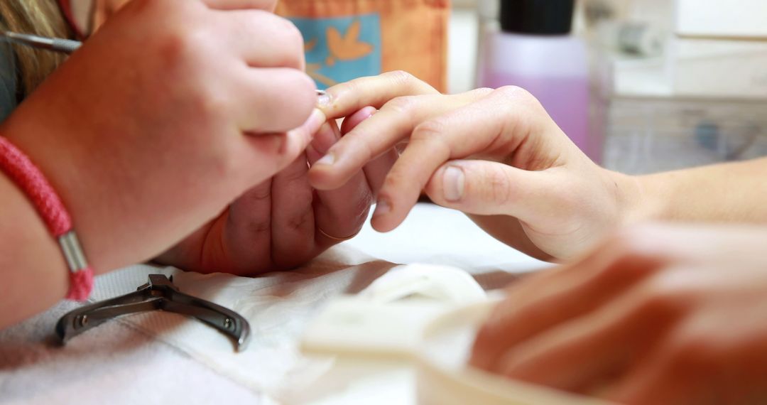 Manicurist Performing Nail Care in Salon - Free Images, Stock Photos and Pictures on Pikwizard.com