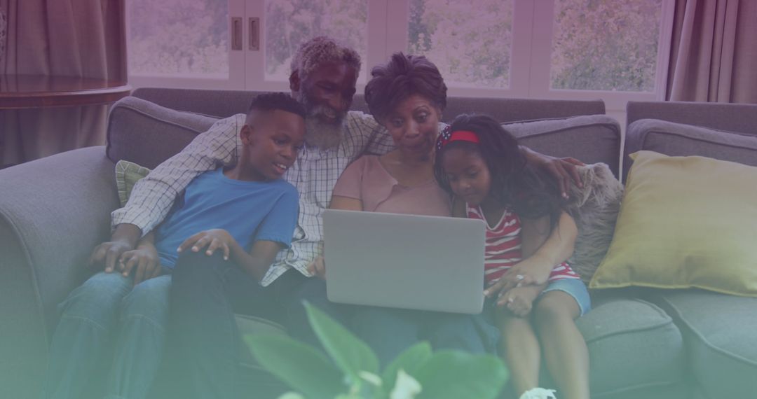 Multigenerational Family Enjoying Time Together with Laptop at Home