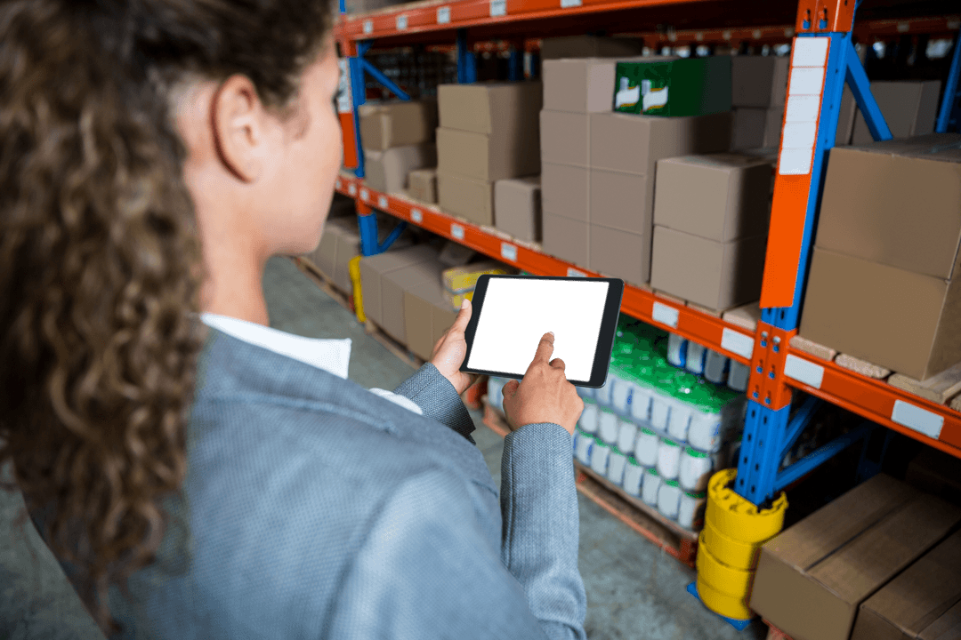 Transparent Screen on Tablet in Warehouse Logistics Management Concept