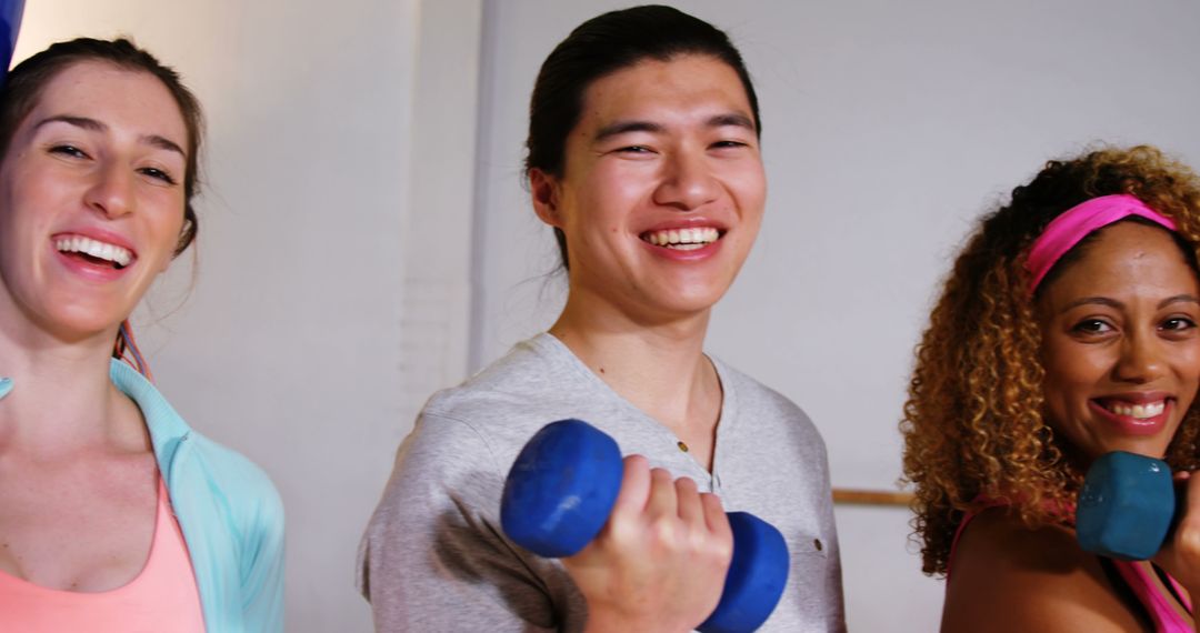 Group of Diverse Young Adults Smiling and Exercising Together - Free Images, Stock Photos and Pictures on Pikwizard.com