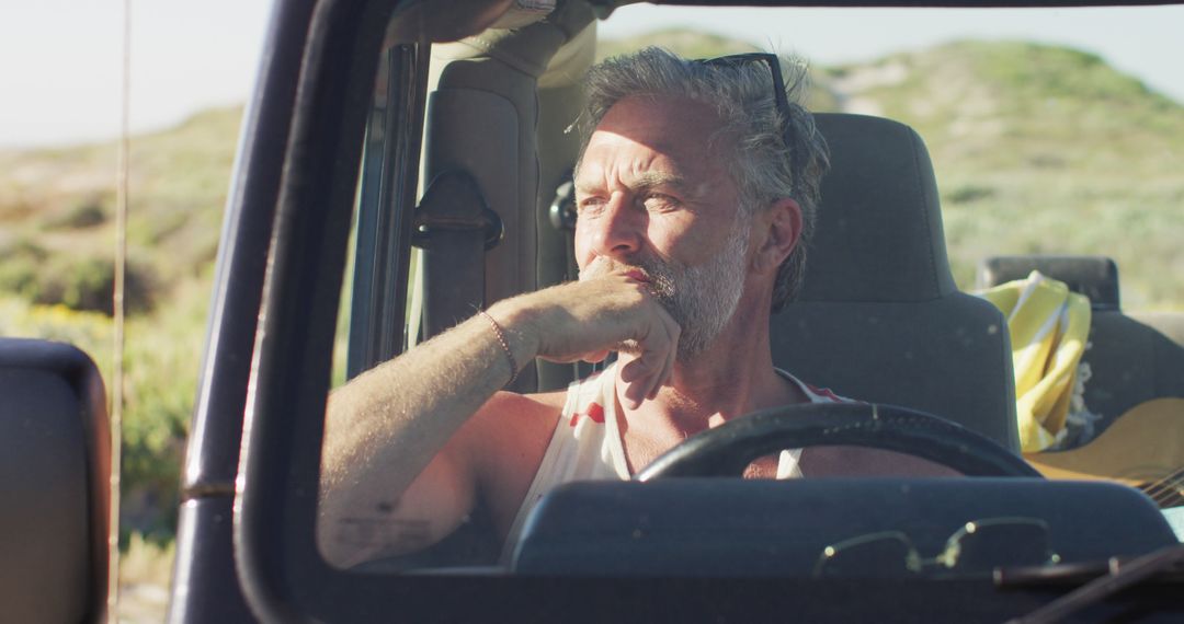 Older Man Reflecting in Car on a Sunny Day - Free Images, Stock Photos and Pictures on Pikwizard.com