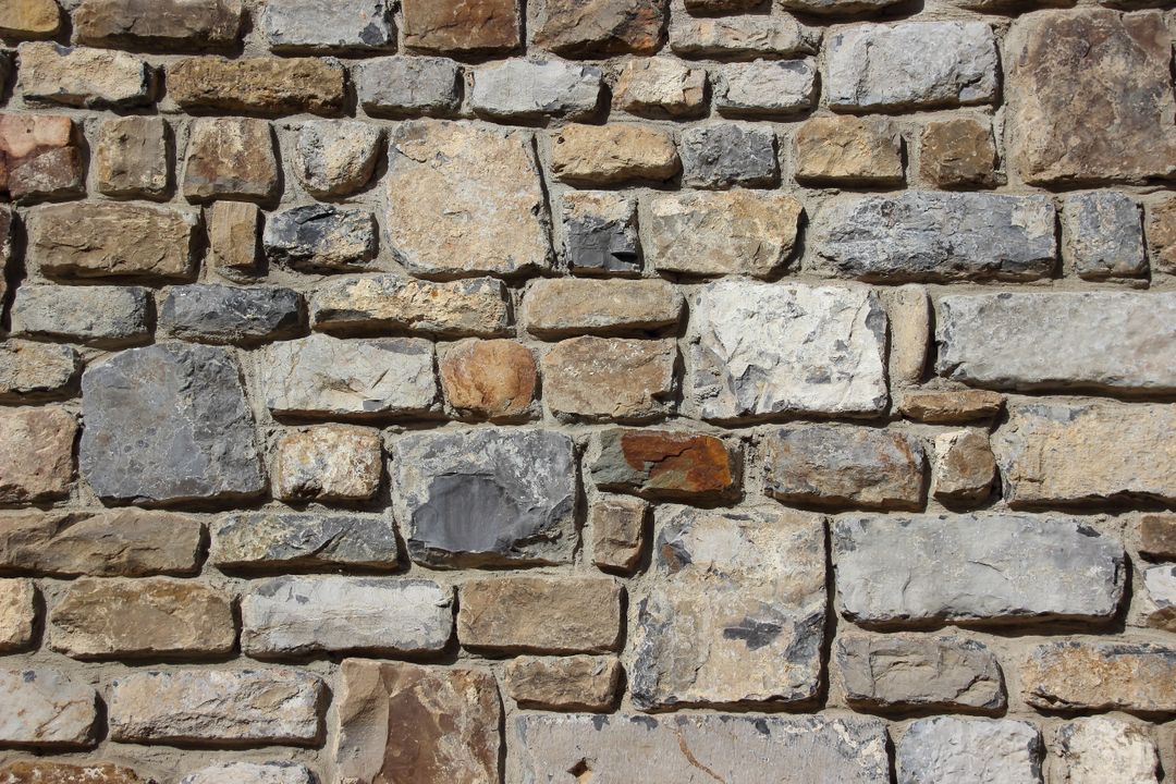 Rustic Stone Wall Texture with Various Shapes and Colors - Free Images, Stock Photos and Pictures on Pikwizard.com