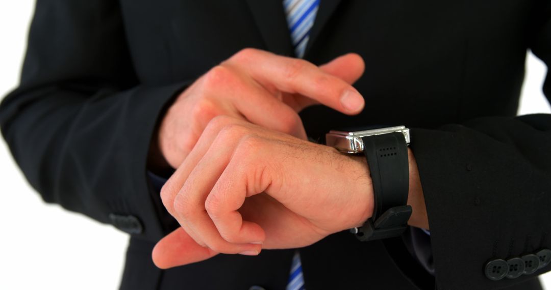 Businessman Checking Time while Wearing Black Suit - Free Images, Stock Photos and Pictures on Pikwizard.com