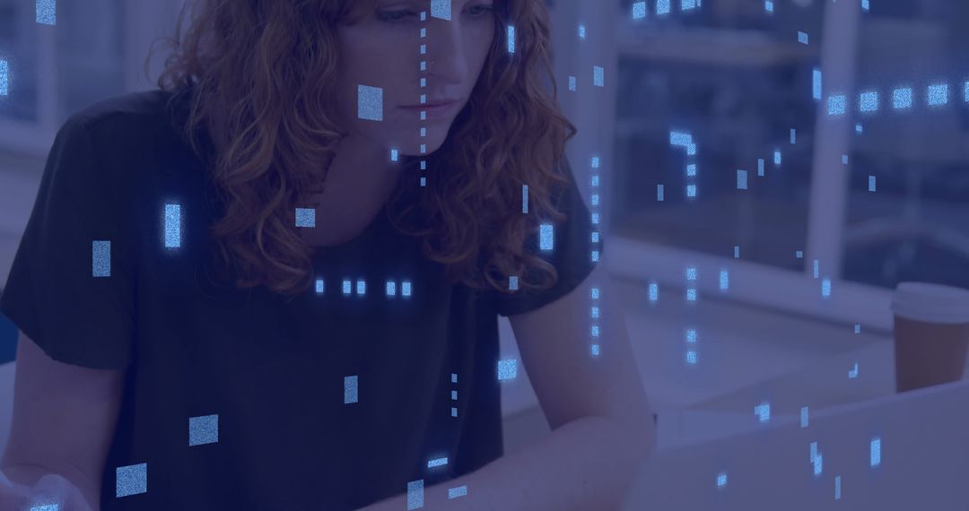 Businesswoman Analyzing Data on Computer in Office