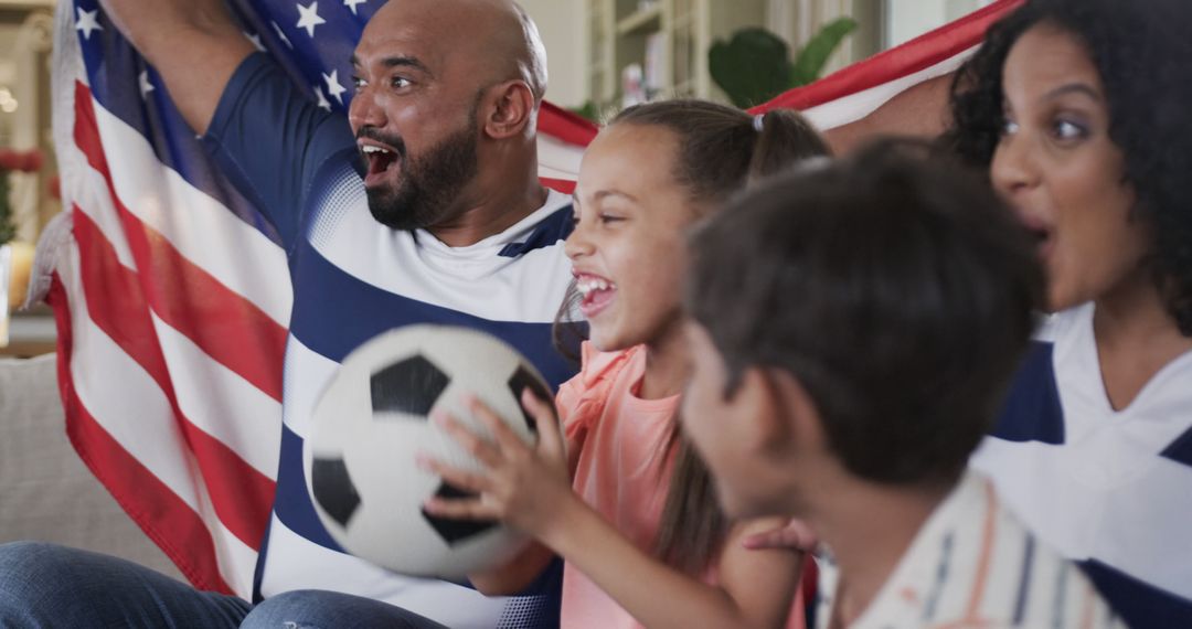 Happy Family Celebrating Soccer Win with USA Flag and Ball - Free Images, Stock Photos and Pictures on Pikwizard.com