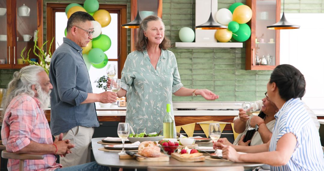 Seniors Enjoying Dynamic Dinner Party Toast with Friends