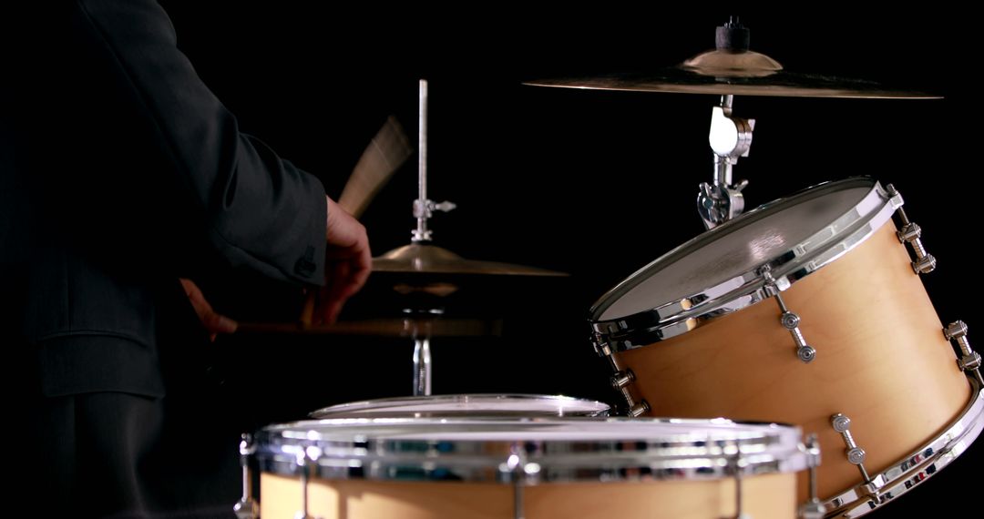 Musician Playing Drum Kit in Dark Studio - Free Images, Stock Photos and Pictures on Pikwizard.com