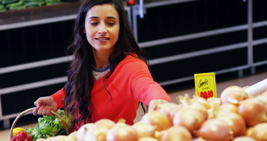 Young Woman Shopping for Fresh Vegetables at Market - Free Images, Stock Photos and Pictures on Pikwizard.com