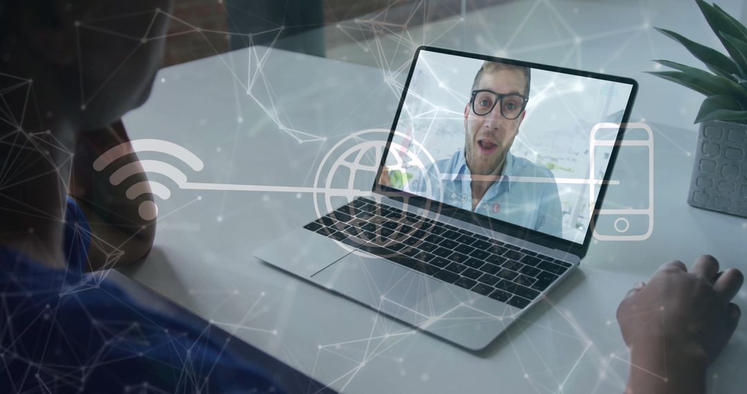 Business Professional on Virtual Call at Modern Desk Workspace