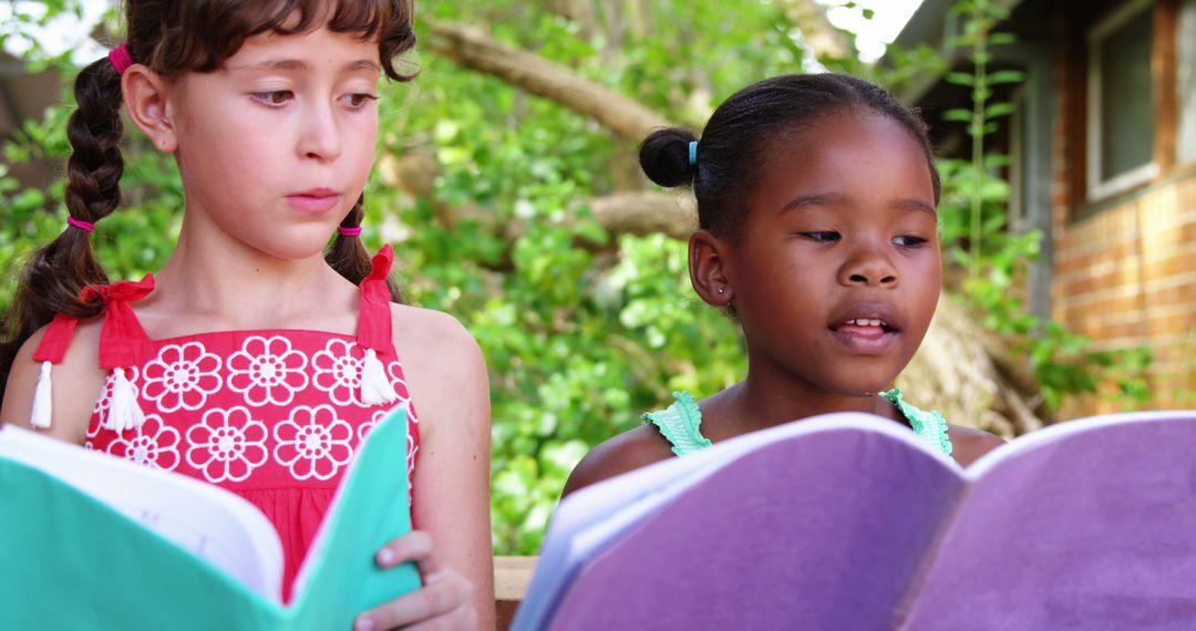 Diverse Children Reading Books Outdoors in Garden - Free Images, Stock Photos and Pictures on Pikwizard.com