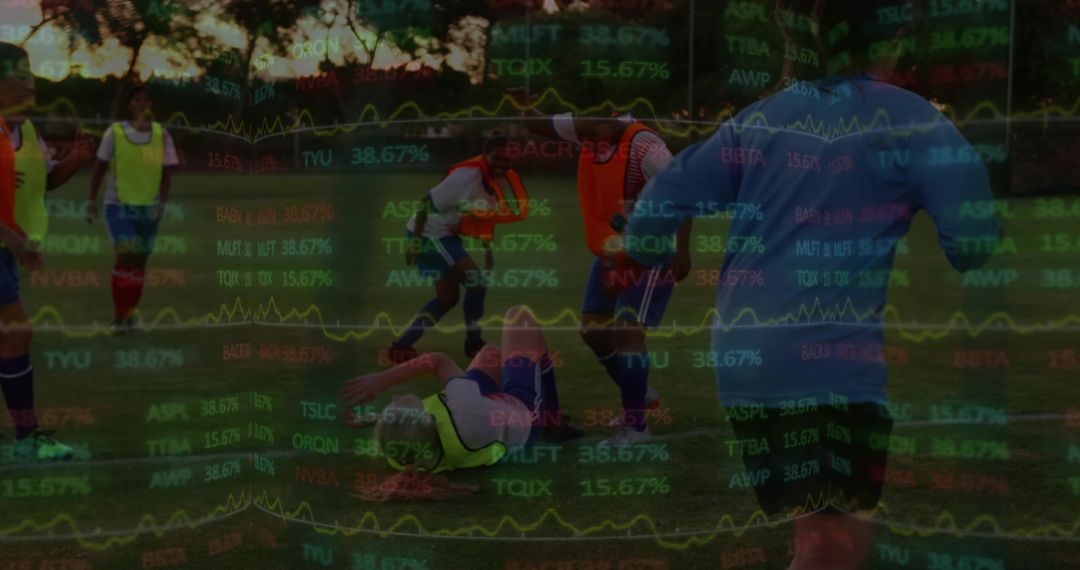 Dusk soccer training with player falling on grass and translucent stock market data overlay