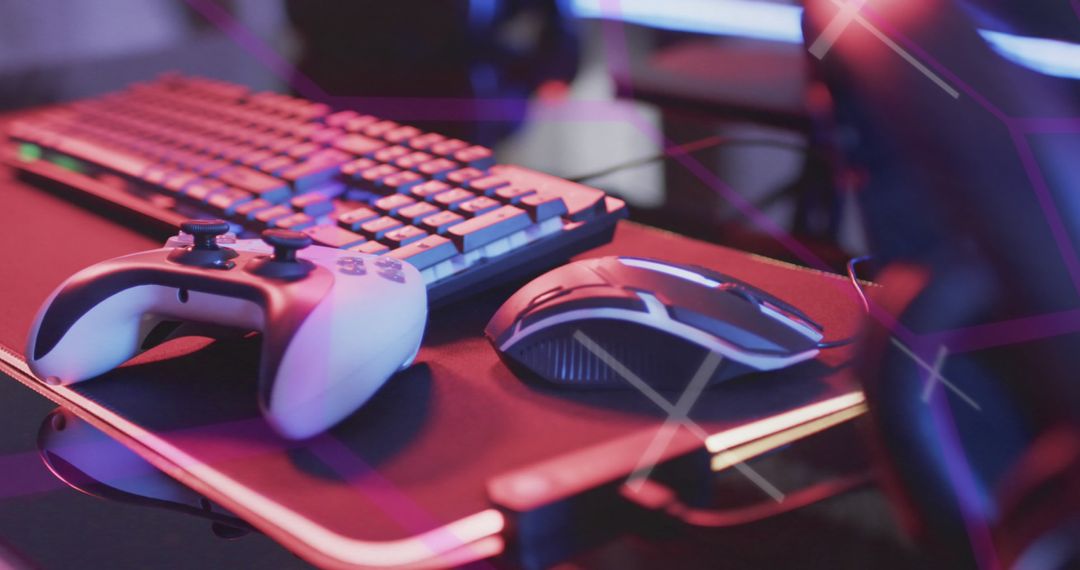Gamer Setup with Keyboard, Controller, and Mouse in Neon Lighting - Free Images, Stock Photos and Pictures on Pikwizard.com