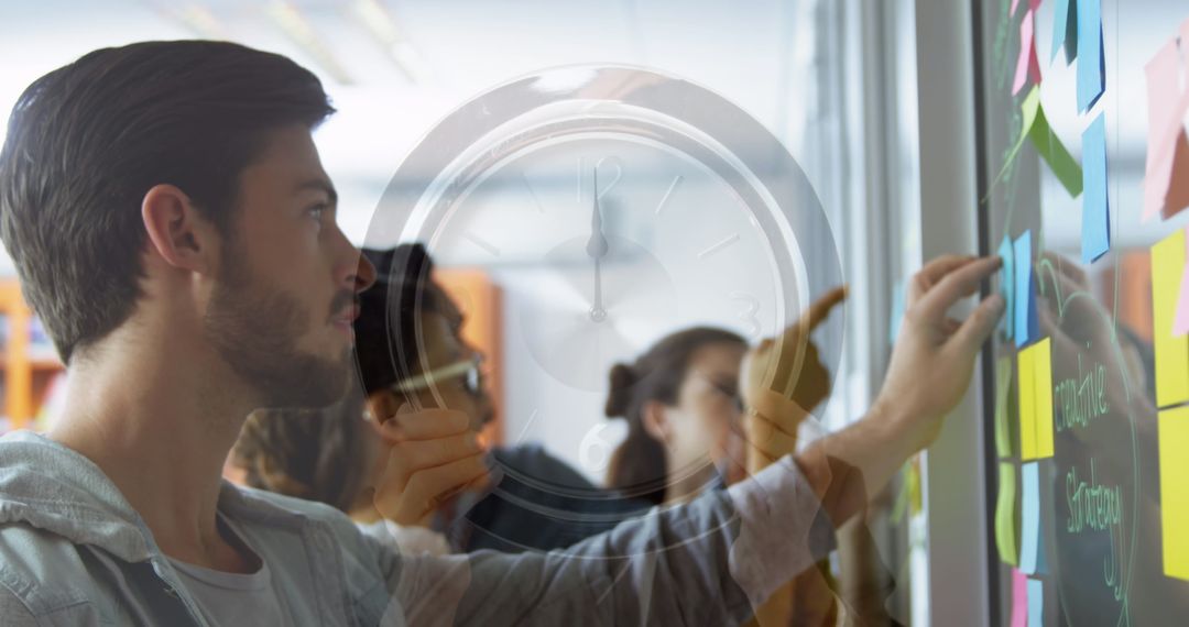 Creative Team Collaborating on Project with Time Management Focus