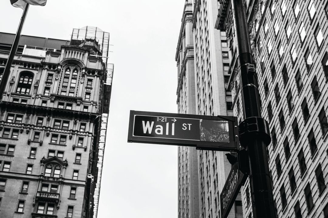 Iconic Wall Street Sign with Historic Buildings in Background - Free Images, Stock Photos and Pictures on Pikwizard.com