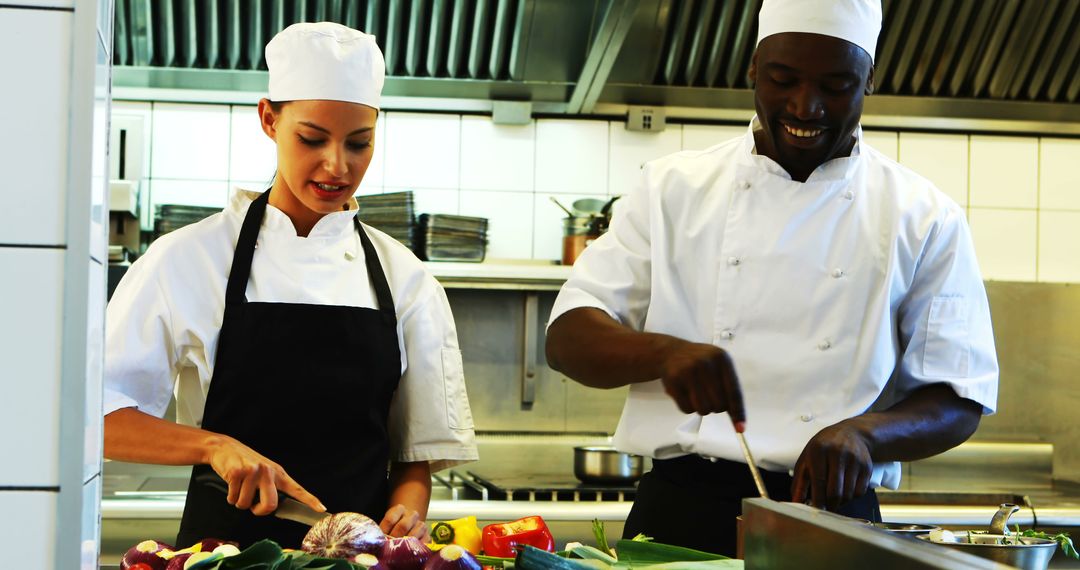Chefs Collaborating in Restaurant Kitchen for Meal Preparation