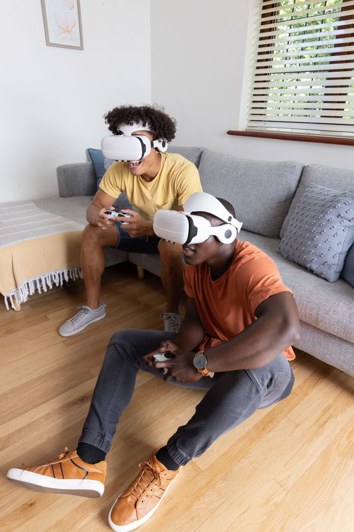Diverse Friends Engaging in Virtual Reality Game Session at Home