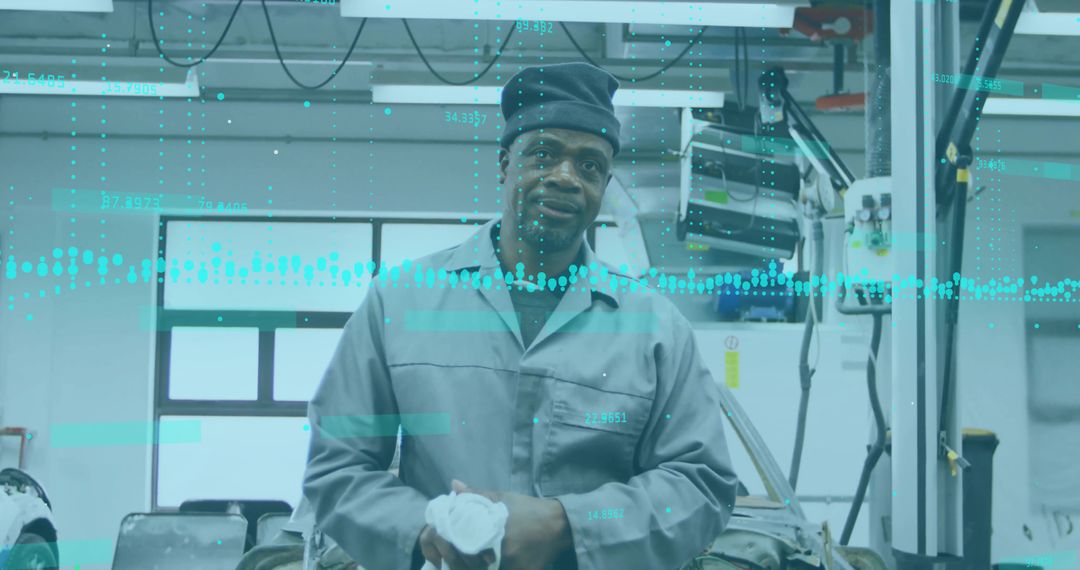 Technician in Industrial Setting Analyzing Graph with High-Tech Background