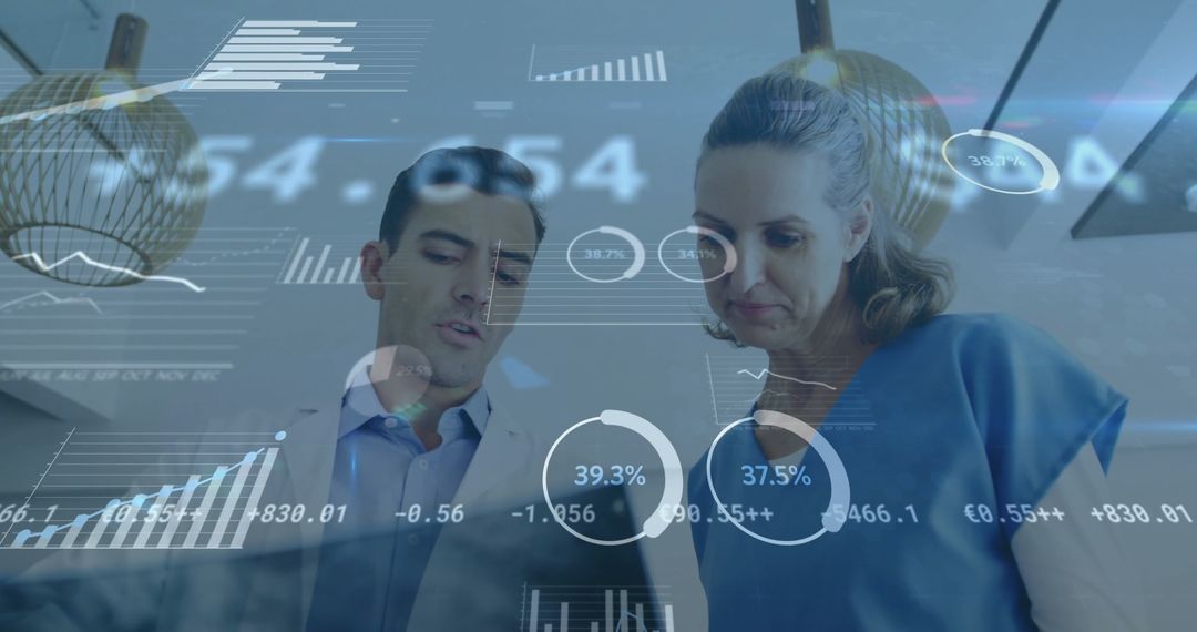 Business Professionals Analyzing Charts in Modern Office Environment