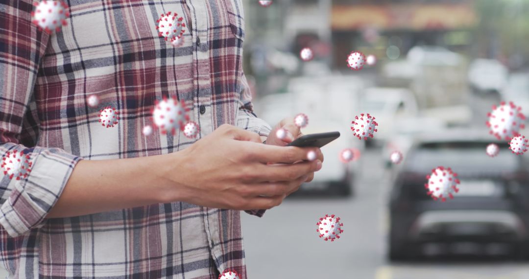 Man Using Smartphone Surrounded by Floating Viruses on Urban Street