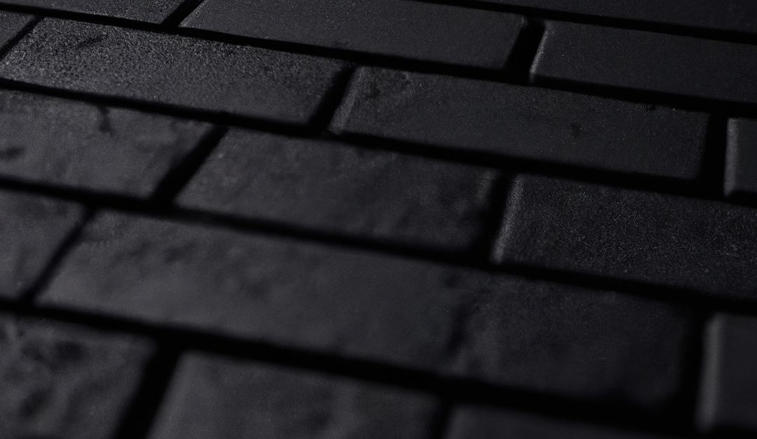 Close-Up of Dark Brick Wall Background - Free Images, Stock Photos and Pictures on Pikwizard.com