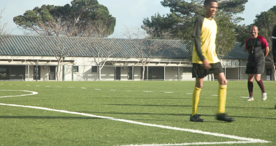 Soccer Player Walking on Field During Practice Match