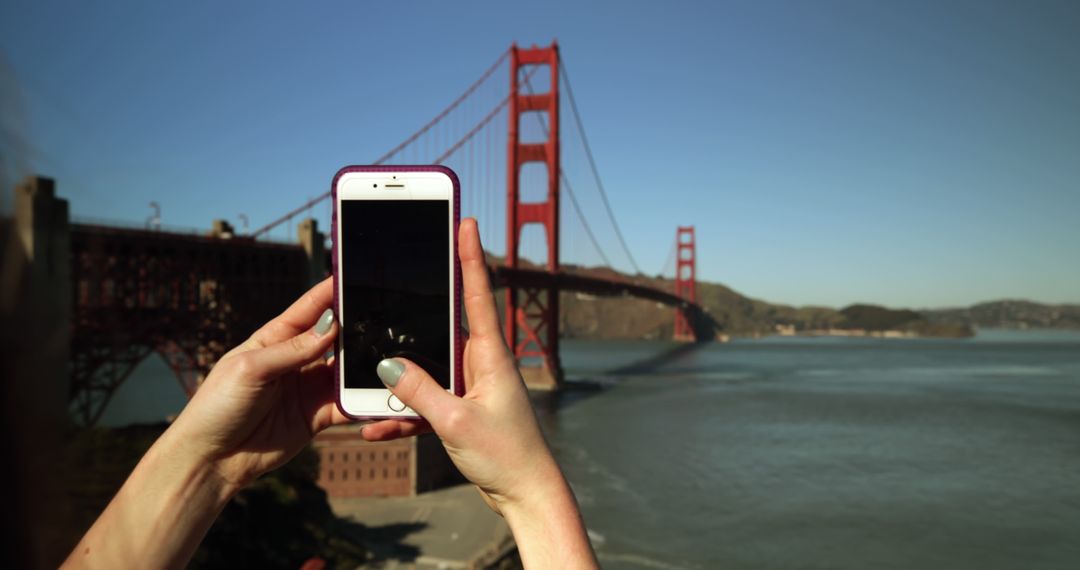 Person Taking Photo of Golden Gate Bridge with Smartphone - Free Images, Stock Photos and Pictures on Pikwizard.com