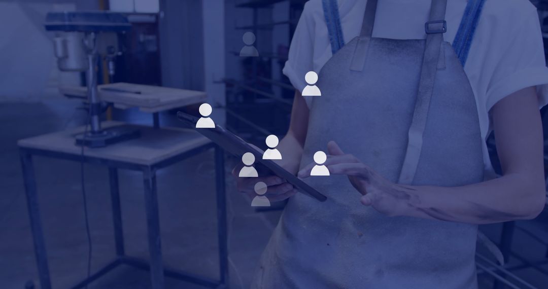 Industrial Worker Using Digital Tablet with Network Icons