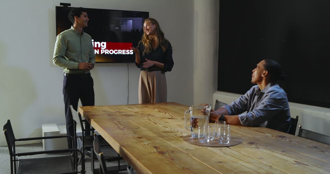 Diverse Team Presentation in Modern Office with Applause