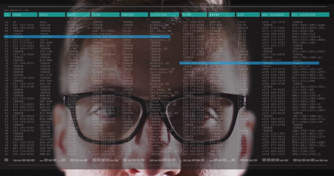 IT Analyst Reviewing Digital Code with Reflected Screens in Glasses