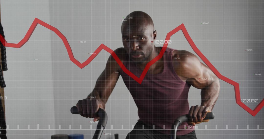 Man Exercising on Stationary Bike With Financial Graph Overlay