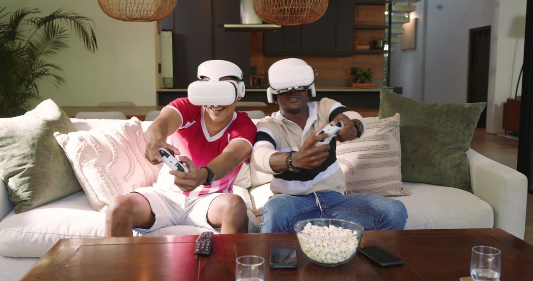 Friends Enjoying VR Gaming on Couch with Snacks at Home