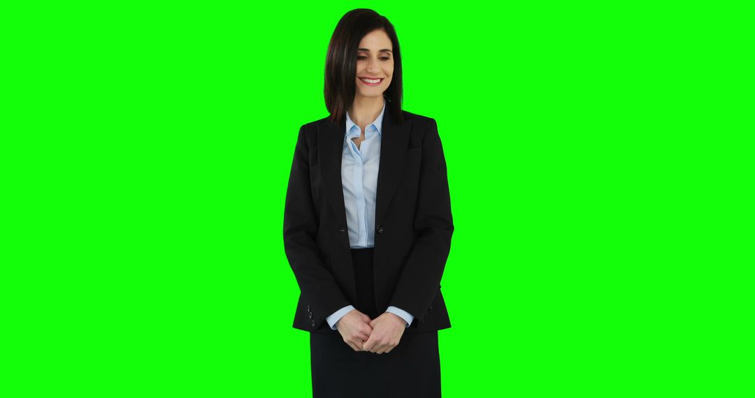 Smiling Businesswoman in Formal Suit on Green Screen Background - Free Images, Stock Photos and Pictures on Pikwizard.com