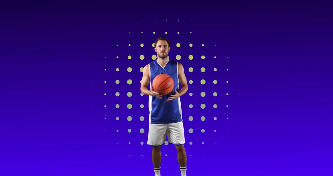 Male Basketball Player Holding Ball Blue Background - Free Images, Stock Photos and Pictures on Pikwizard.com