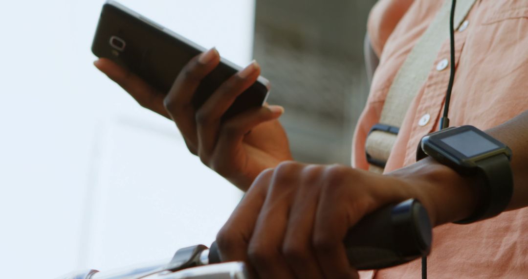 Close-Up of Person Using Smartphone While Riding Scooter - Free Images, Stock Photos and Pictures on Pikwizard.com