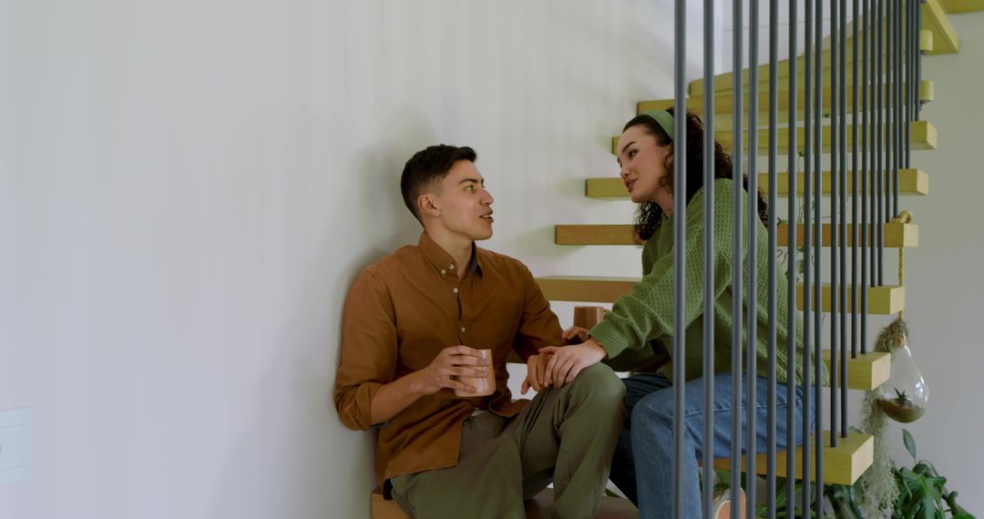 Couple Sharing Intimate Moment on Floating Stairs