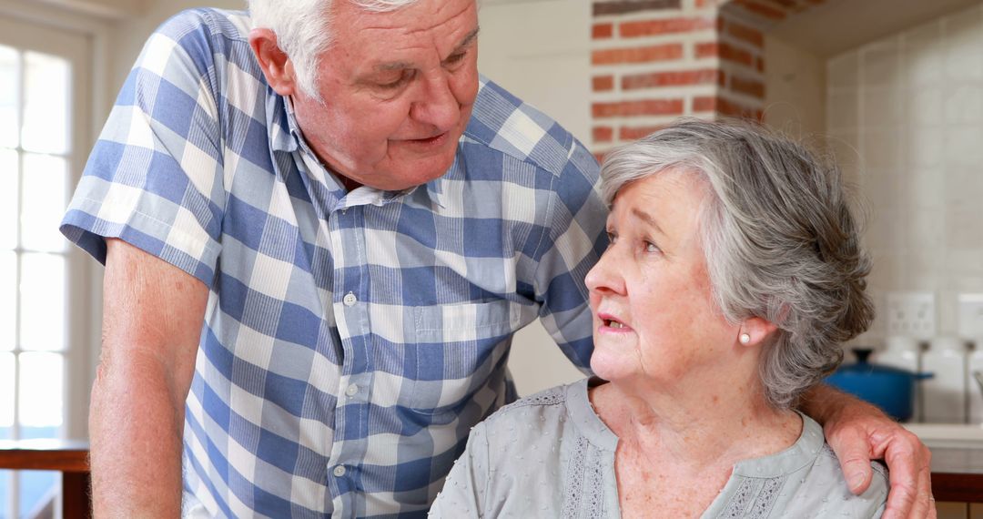 Senior Couple Sharing an Emotionally Tender Moment at Home - Free Images, Stock Photos and Pictures on Pikwizard.com