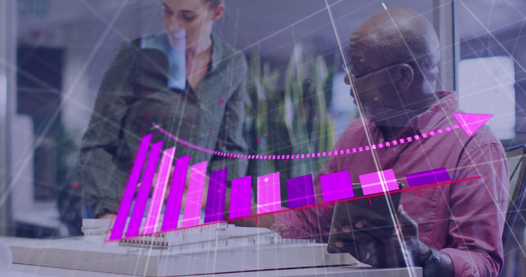 Diverse Business Team Analyzing Financial Data Displays