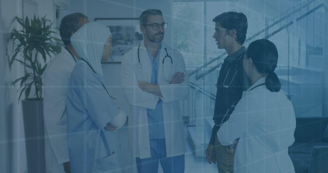 Diverse Doctors Engaging in Medical Consultation with Data Overlay