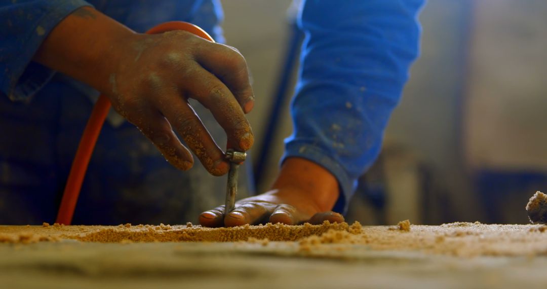 Close-Up View of Woodworker's Hands Using Power Tool - Free Images, Stock Photos and Pictures on Pikwizard.com