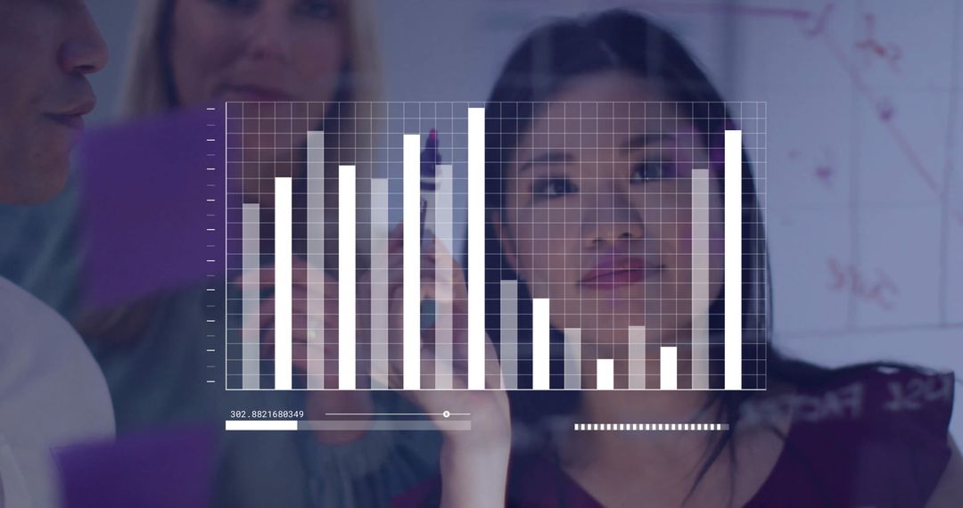 Business Team Analyzing Data with Interactive Graph