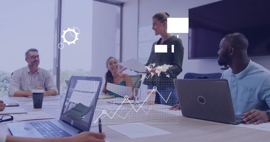 Diverse Business Team Analyzing Digital Data Insights in Modern Office